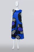 PLEATS PLEASE ISSEY MIYAKE - A SAPPHIRE BLUE RECORD PRINT PLEATED SWING DRESS