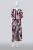 PLEATS PLEASE ISSEY MIYAKE - A VIBRANT GEOMETRIC PLEATED TOP AND TROUSERS SET