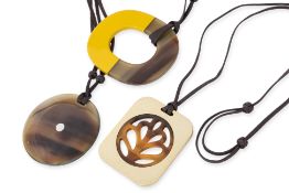 HERMÈS - A GROUP OF THREE HORN PENDANTS