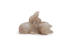 A SMALL JADE CARVING OF A MYTHICAL BEAST