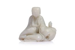 A WHITE JADE CARVING OF GUANYIN