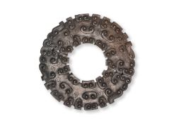 A DARK-BROWN ARCHAISTIC JADE DISC