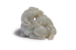 A CARVED WHITE JADE TWO RAMS GROUP
