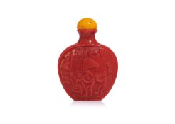 A RED GLASS SNUFF BOTTLE WITH EROTIC DECORATION