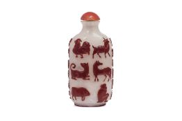 A RED OVERLAY GLASS 'TWELVE ZODIAC ANIMALS' SNUFF BOTTLE