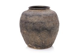 AN EARTHENWARE POTTERY JAR WITH PRESSED TEXTILE DECORATION