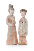 TWO PAINTED POTTERY FIGURES OF FEMALE COURT ATTENDANTS