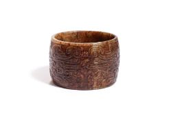 AN ARCHAISTIC JADE BROAD BANGLE