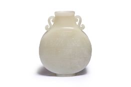 A PALE CELADON JADE MOON FLASK