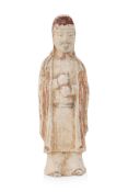 A PAINTED POTTERY FIGURE OF A MALE COURT ATTENDANT
