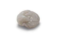 A WHITE JADE CARVING OF DEER