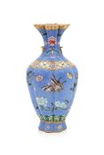 A FAMILLE ROSE BLUE SGRAFFITO GROUND 'ENDLESS KNOT' FORM VASE