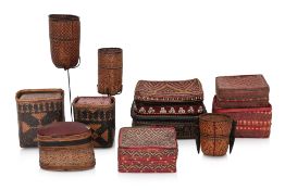 A COLLECTION OF SOUTH EAST ASIAN RATTAN BETEL BOXES AND BASKETS