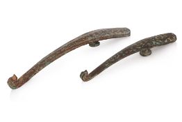 TWO SILVER AND GOLD INLAID BRONZE BELT HOOKS