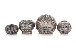 A GROUP OF FOUR SOUTH EAST ASIAN SILVER BOXES AND COVERS
