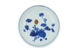 A BLUE AND WHITE PEONY DECORATED DISH