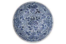 A LARGE BLUE AND WHITE PEONY DISH