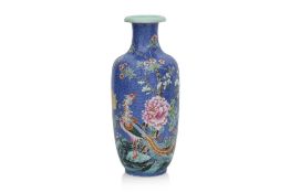 A BLUE SGRAFFITO-GROUND FAMILLE ROSE 'PHOENIX AND PEONY' VASE