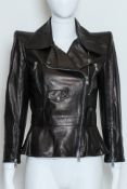 ALEXANDER MCQUEEN - A BLACK LEATHER MOTO JACKET WITH SILK LINING