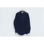 COMME DES GARÇONS SHIRT - A MEN'S BUTTON UP SHIRT WITH QUILTED DETAILS