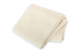 HERMÈS - A CREAM KNITTED WOOLLEN SCARF