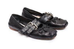 MIU MIU - A PAIR OF BLACK LEATHER BALLET FLATS WITH TWIN BUCKLE STRAPS