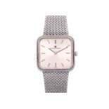 UNIVERSAL GENEVE - A SQUARE SILVER-TONE WRISTWATCH