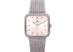 UNIVERSAL GENEVE - A SQUARE SILVER-TONE WRISTWATCH