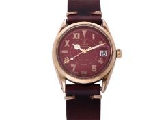 TUDOR - AN OYSTERDATE AUTOMATIC WRISTWATCH WITH RED DIAL