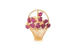 A CARVED RUBY 'FLOWER BASKET' BROOCH