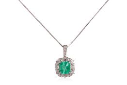 AN EMERALD AND DIAMOND PENDANT NECKLACE