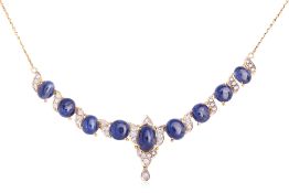 AN UNHEATED BURMESE SAPPHIRE CABOCHON AND DIAMOND NECKLACE