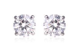 A PAIR OF DIAMOND 'SOLITAIRE' STUD EARRINGS