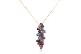 A MULTI-COLOUR STAR SAPPHIRE AND DIAMOND BROOCH WITH A GOLD CHAIN