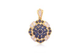 A SAPPHIRE AND DIAMOND CLUSTER PENDANT