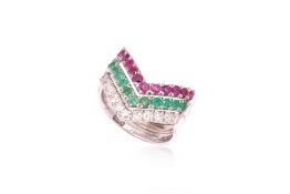 A SET OF DIAMOND, RUBY AND EMERALD STACKING RINGS