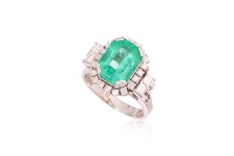AN EMERALD AND DIAMOND RING