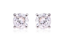 A PAIR OF DIAMOND 'SOLITAIRE' STUD EARRINGS