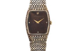 GIRARD-PERREGAUX - A SILVER-GILT DRESS WATCH WITH TIGER'S EYE AND DIAMOND DIAL