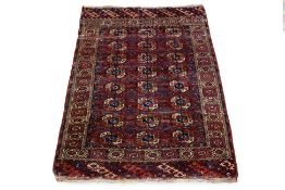 AN ANTIQUE TURKMEN BOKHARA WOOL RUG (164 X 106CM)