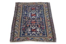 A CAUCASIAN 'LESGHI STAR' WOOL RUG (163 X 107CM)
