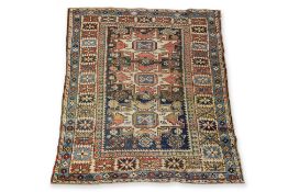 A CAUCASIAN 'LESGHI STAR' DESIGN TRIBAL WOOL RUG (136 X 104CM)