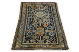 A CAUCASIAN 'RAM'S HORN' DESIGN WOOL RUG (162 X 110CM)