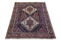 A KURDISH WOOL RUG (210 X 163CM)