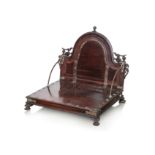 AN INDIAN TEAK TRAVELLING FOLDING CHAIR