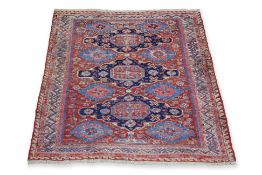 AN ANTIQUE SOUMAK TRIPLE MEDALLION WOOL RUG (180 X 150CM)