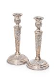 A PAIR OF EGYPTIAN SILVER CANDLESTICKS