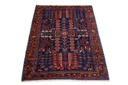 A TRIBAL 'TREE OF LIFE' DESIGN WOOL RUG (200 X 132CM)