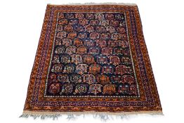 A KURDISH WOOL RUG WITH DIAGONAL BOTEH DESIGN (175 X 135CM)