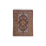 A LARGE MASHAD WOOL CARPET (282 x 198cm)